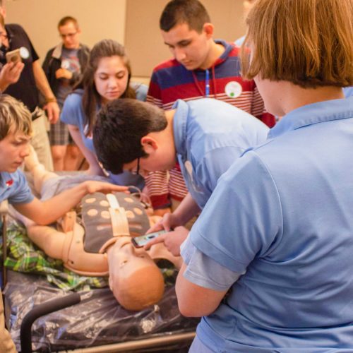 Students programming at challenge event Students programming at challenge event