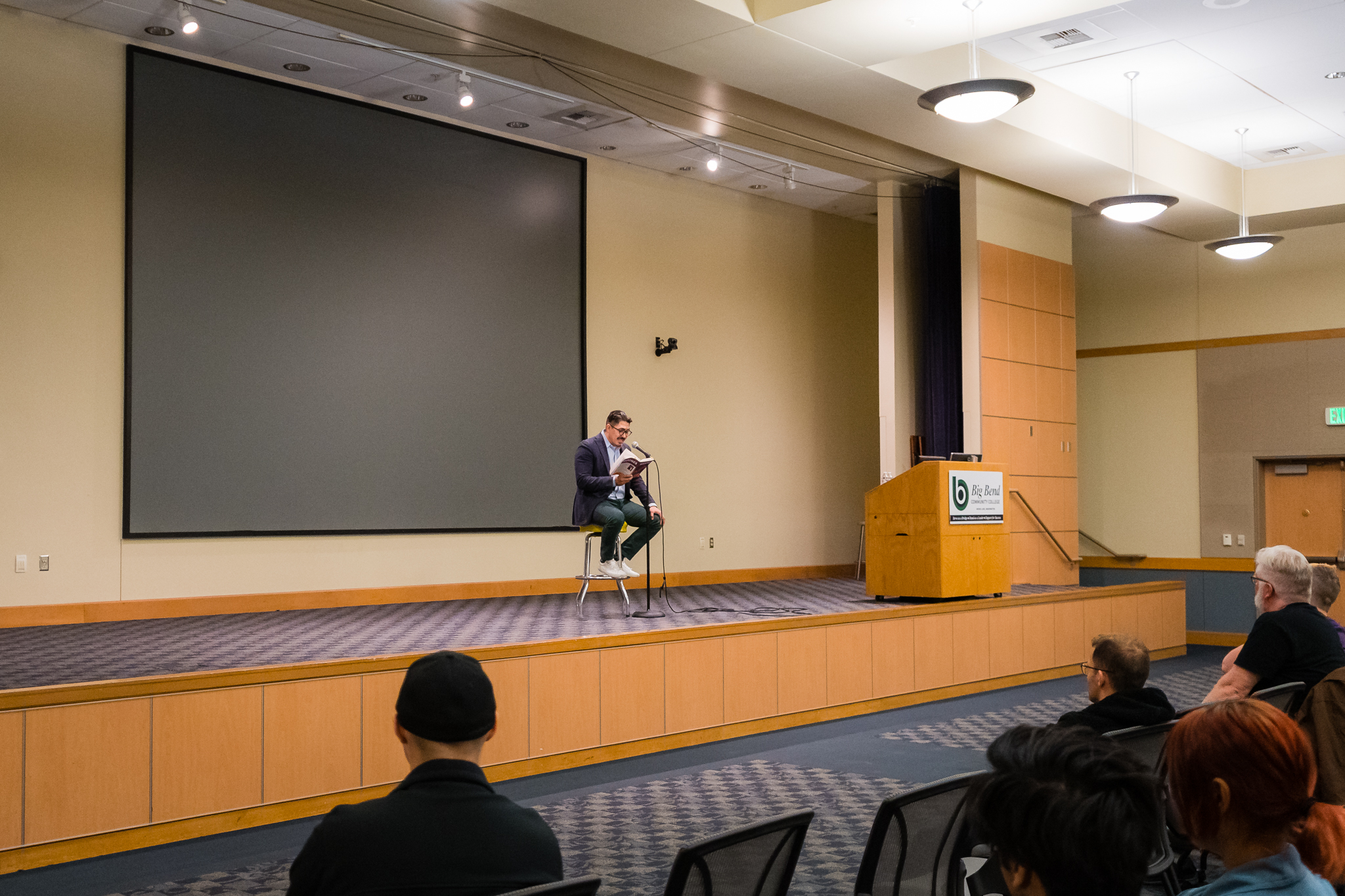 BBCC alum Ricardo Ruiz reads on stage